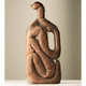 Illustration for article titled Photographs Of Meat Stuffed In Plastic Bottles Evoke Fleshy Horrors